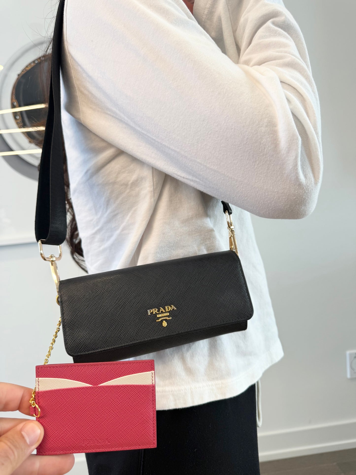 Authentic Prada Saffiano flap wallet with removable original cardholder added adjustable strap original authentic card and box ! Retail $1420 in stores now . Phones fit etc