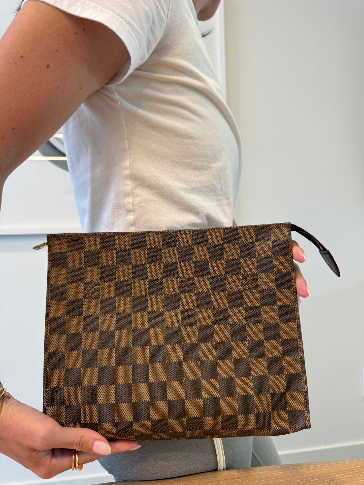 Authentic Louis Vuitton Toiletry 26 zipper top clutch in pristine preloved condition inside and out in dustbag! Retail $1500!