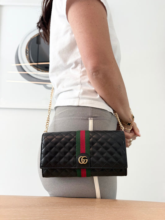 Authentic Gucci Ophidia Marmont Quilted Flap xl wallet with added removeable strap in box . Rare floral interior! Phones cards cash coins etc fit ! Stunning condition inside and out