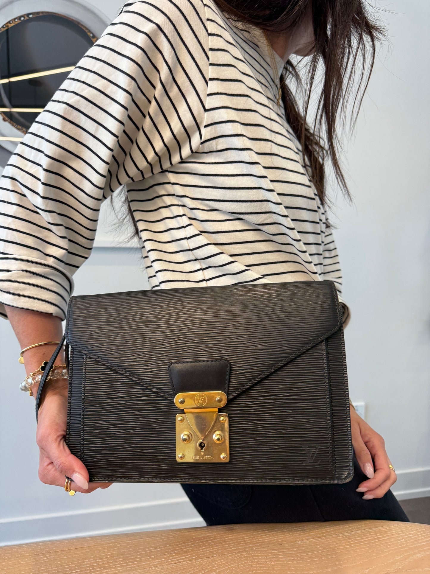 Louis Vuitton epi dragonne crossbody clutch with original wristlet and added strap in gorgeous condition inside and out ! Fits phones wallets makeup etc