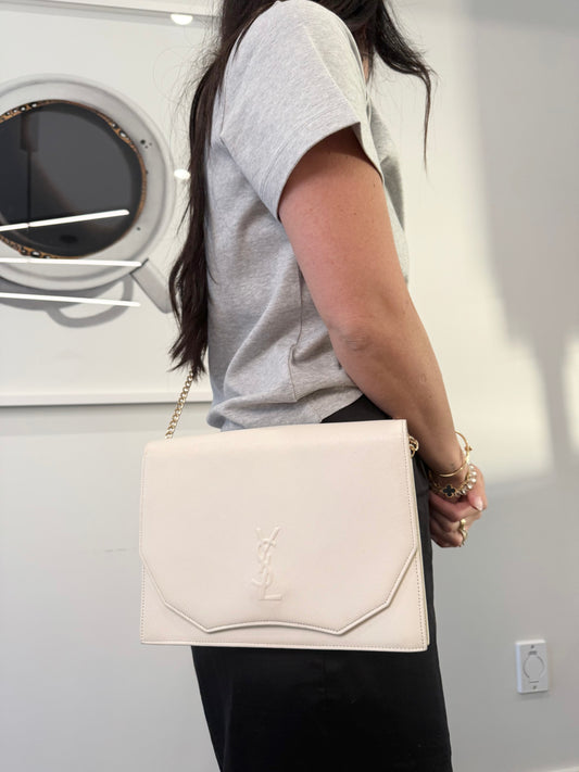 Yves saint Laurent magnetic flap crossbody clutch in white /gold! Fits phones keys wallets makeup etc