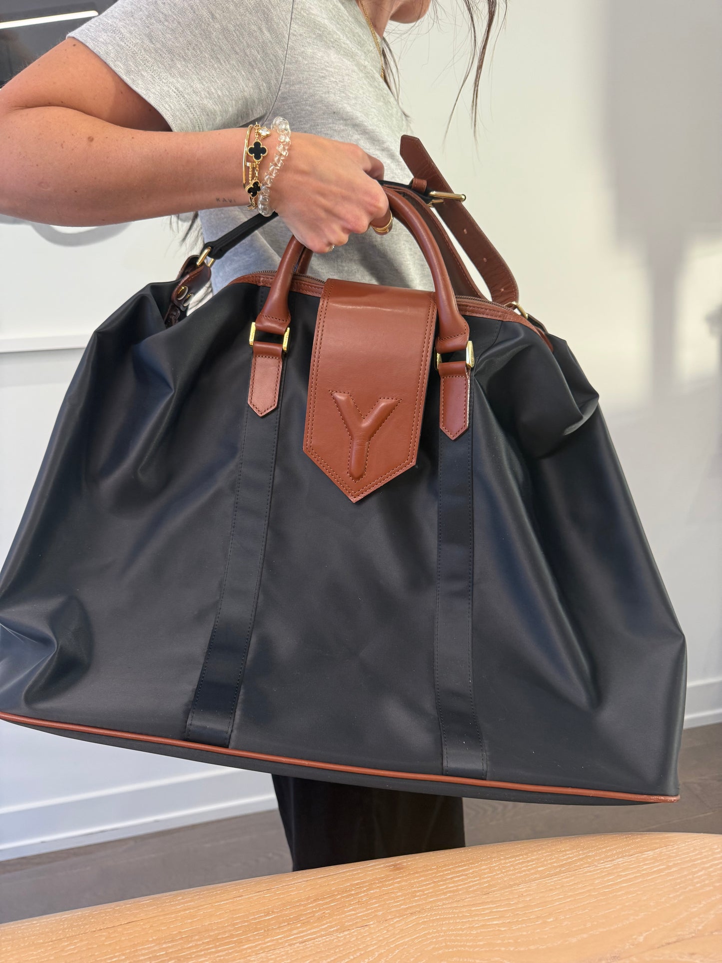 Rare Heavy duty Yves saint Laurent duffle bag with original shoulder strap and original crossbody adjustable strap ! Magnetic closure heavy duty !