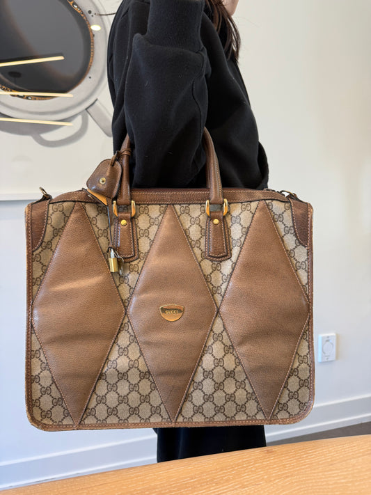Gucci supreme diamainte heavy duty top handle bag with original lock and keys plus original side hooks for a crossbody strap!! Heavy heavy duty