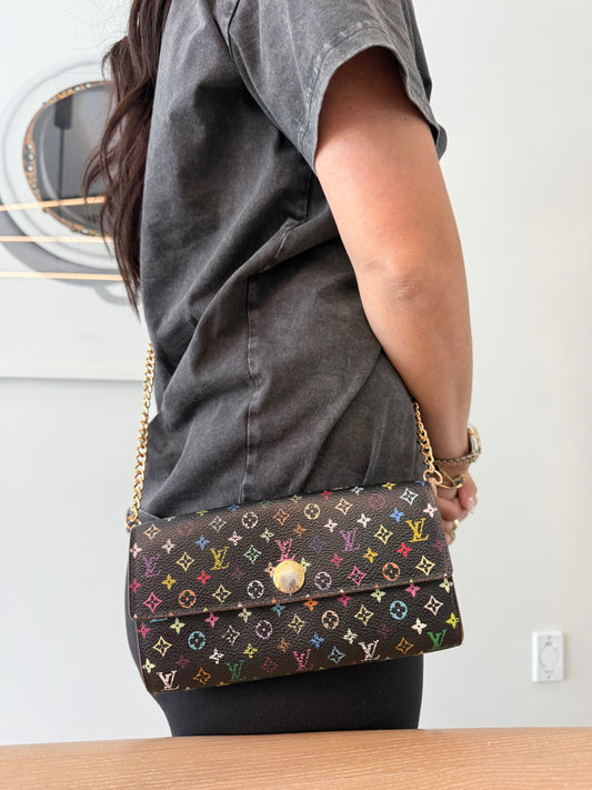 Authentic Louis Vuitton limited edition black Murakami lime interior Sarah wallet with added removeable strap In dustbag !  Fits phones cards cash coins etc