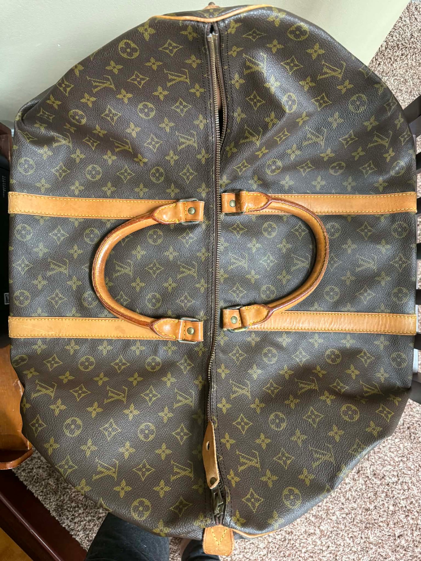 Upcycled 100% authentic keychain with brown tan interior made from a keepall 60